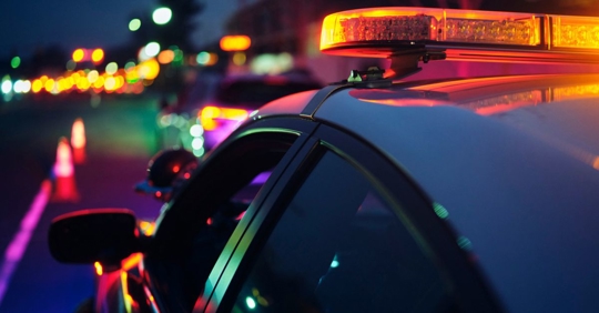 police car stopping a vehicle