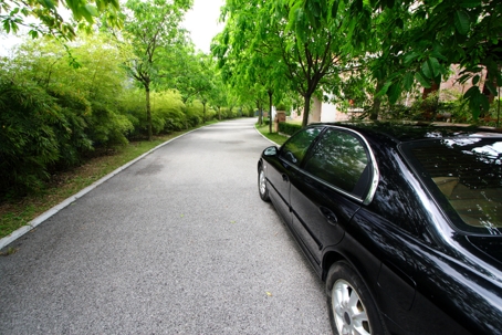 car in hotel driveway