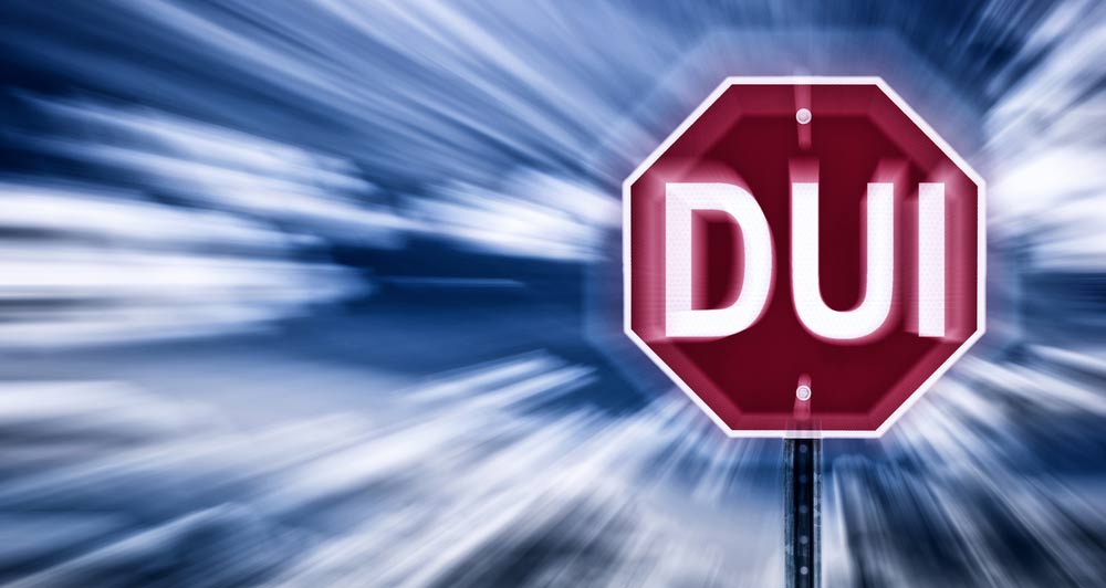A stop sign that says DUI.